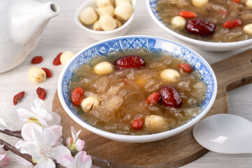 Close up of sweet snow white fungus soup with lotus seed, Chinese red dates and wolfberry.