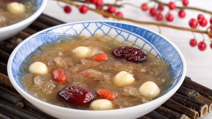 Close up of sweet snow white fungus soup with lotus seed, Chinese red dates and wolfberry.