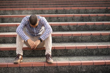 Men who suffer from work and life grief, and unemployment