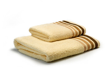 set of beige towels on a white background, a set for a bathroom