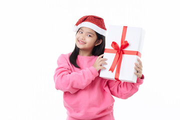 Asian Child hugging Christmas gift box in hand