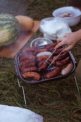 sausages on the grill