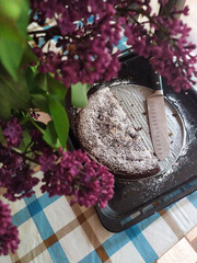 still life with flowers and cake