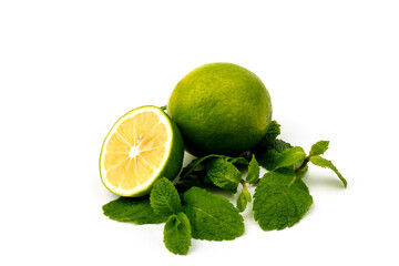 Lime with mint leaves isolated on white background.