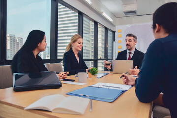 Businesspeople meeting in office teamwork discussing marketing project