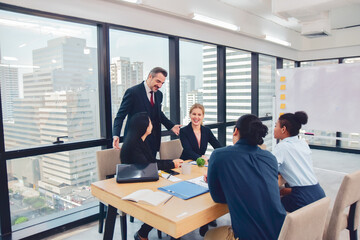 Businesspeople meeting in office teamwork discussing marketing project