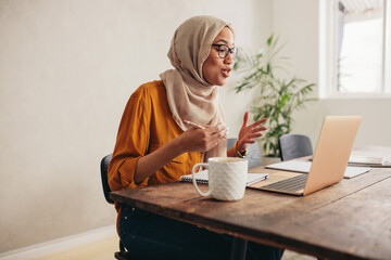 Muslim business woman on a zoom video call