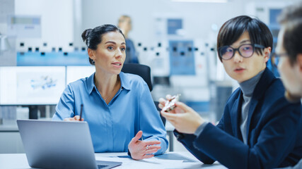 Modern Factory Office Meeting Room: Multi Ethnic and Diverse Team of Engineers, Managers and...