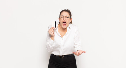 young blonde woman looking angry, annoyed and frustrated screaming wtf or what’s wrong with you