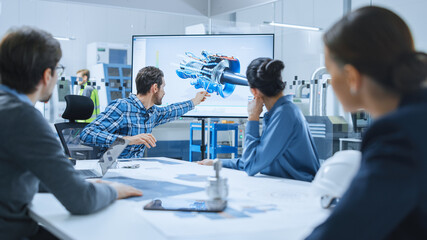 Modern Factory Office Meeting Room: Diverse Team of Engineers, Managers and Investors Talking at Conference Table, Use Interactive TV, Analyze Sustainable Energy Engine Blueprints. High-Tech Facility - obrazy, fototapety, plakaty