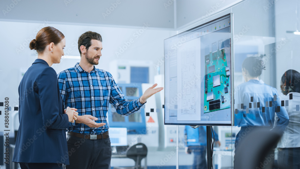 Aufkleber Female Computer Engineer and Male Project Manager Use Digital Interactive Whiteboard That Shows 3D Printed Circuit Board Concept. Developers Find Problem Solution. Modern Factory Meeting Room