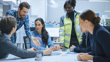 Busy Diverse Team of Computer Engineers, Specialists Gather Around Conference Table, They Discuss...