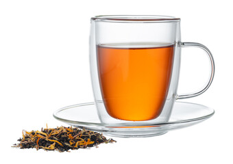 Glass cup of tea with dry tea leaves isolated on white