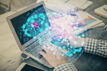 Man typing on keyboard background with brain hologram. Concept of big Data.