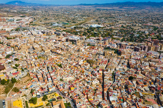 General aerial view of Lorca cityscape on sunny fall day, Murcia, Spain..