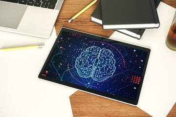 Top view of modern digital tablet monitor with creative artificial Intelligence symbol. Neural networks and machine learning concept. 3D Rendering
