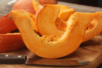 Fresh ripe pumpkin on a wooden table  