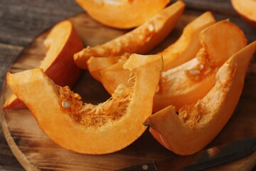 Fresh ripe pumpkin on a wooden table  