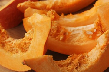 Fresh ripe pumpkin on a wooden table  