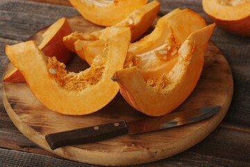 Fresh ripe pumpkin on a wooden table  