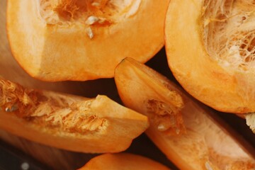 Fresh ripe pumpkin on a wooden table  