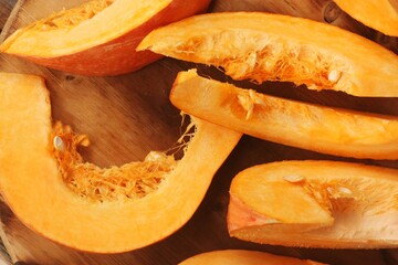 Fresh ripe pumpkin on a wooden table  