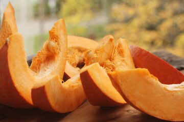 Fresh ripe pumpkin on a wooden table  