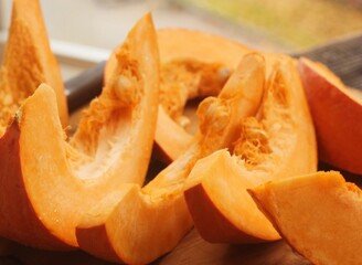Fresh ripe pumpkin on a wooden table  