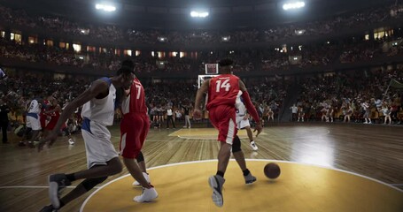 Basketball player scores a goal on a professional basketball stadium. Stadium is made in 3d with animated crowd. Dynamic shot. - Powered by Adobe