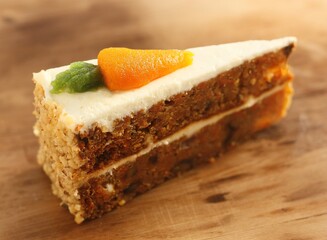 Delicious carrot cake on a wooden table 