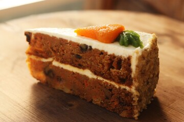 Delicious carrot cake on a wooden table 