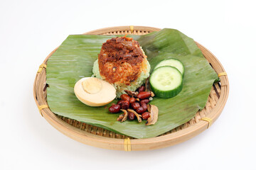 Nasi Lemak fragrant rice cooked in coconut milk served with sambal friend peanut anchovy boiled egg...