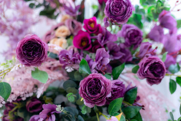 Closeup image of beautiful flowers wall background with amazing colorful roses. Top view