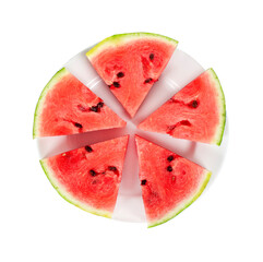 Triangular slices of ripe red watermelon on a white plate. Isolated on white background. View from above