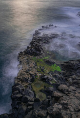 Mesa del Mar volcanic rocks coastline, long exposure photography, Atlantic ocean with sunset light, Tacoronte, Tenerife, Canary islands, Spain