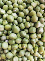 fresh raw green peas in bulk, vegetarian protein food