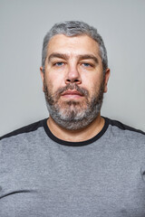 Fototapeta premium portrait of a gray-haired man 40-50 years old with a beard