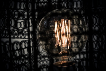 Fototapeta na wymiar Decorative antique edison style light bulbs are in fact contamplorary LED light bulds made to look like old school. Creating old style look and saving energy