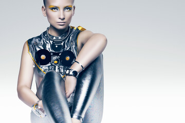 sitting cyborg woman in costume