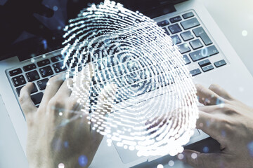 Multi exposure of abstract creative fingerprint illustration with hands typing on computer keyboard on background, digital access concept