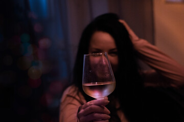 woman with glass of white wine