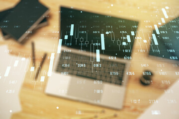 Abstract creative stats data concept on modern laptop background. Multiexposure