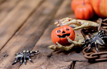 Halloween decoration. Trick or treat in autumn and fall season. Pumpkin face and scary symbol on...
