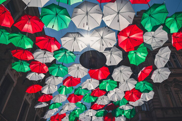 Fototapeta na wymiar Umbrellas at sky