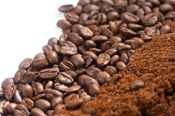 Coffee Beans and Grounds background.Roasted coffee beans and grounds close up from above selective focused.