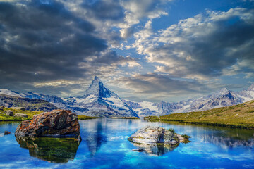 Stunning panorama with Matterhorn and beautiful alpine lake, Stellisee, Valais region,...