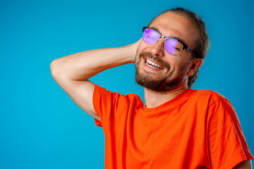 Portrait of a funny nerd man in glasses
