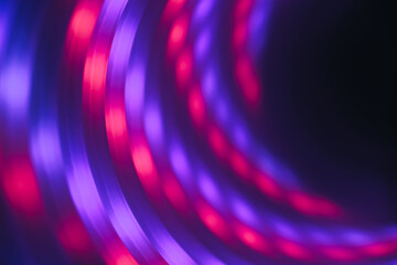 Abstract swirl tunnel with violet light on a background pattern textured for design.