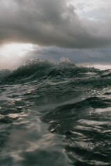 breaking sun with heavy waves 
