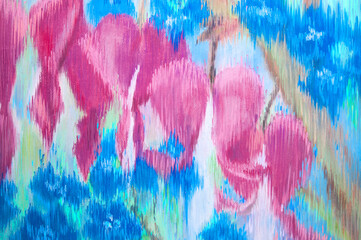 Flowers of dicentras painted on paper by a pastel. Blue and magenta are used for drawing. The picture is quite abstract.